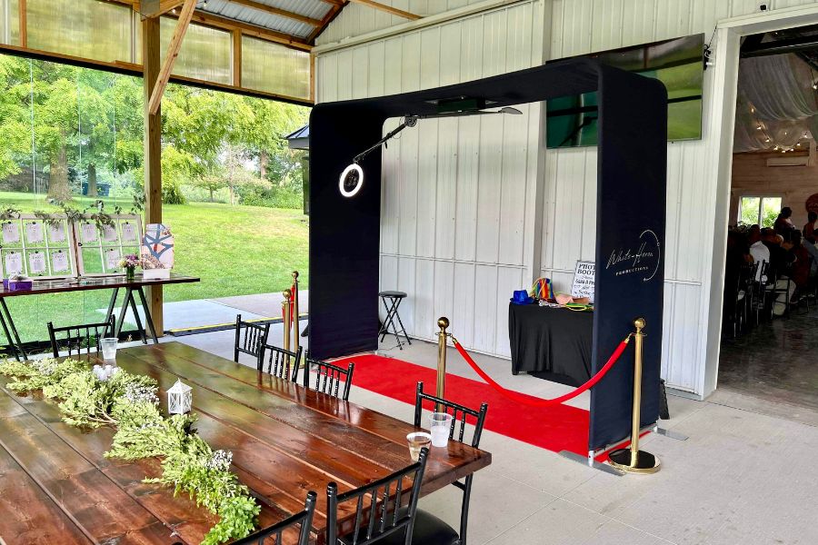 Overhead 360 photo booth setup by White Heron Productions at an outdoor event in Minneapolis.